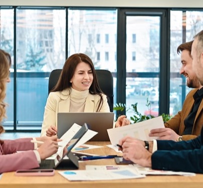 Security team reviewing compliance tools in an office